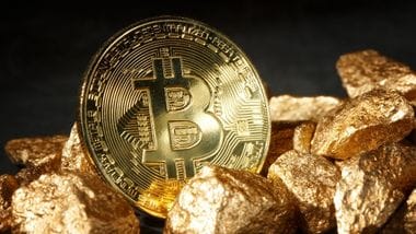 A Bitcoin with gold nuggets